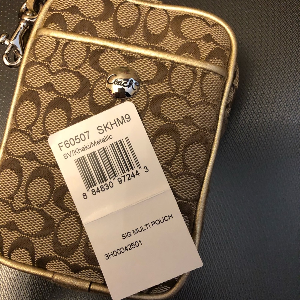 Coach cell phone case or change purse with strap